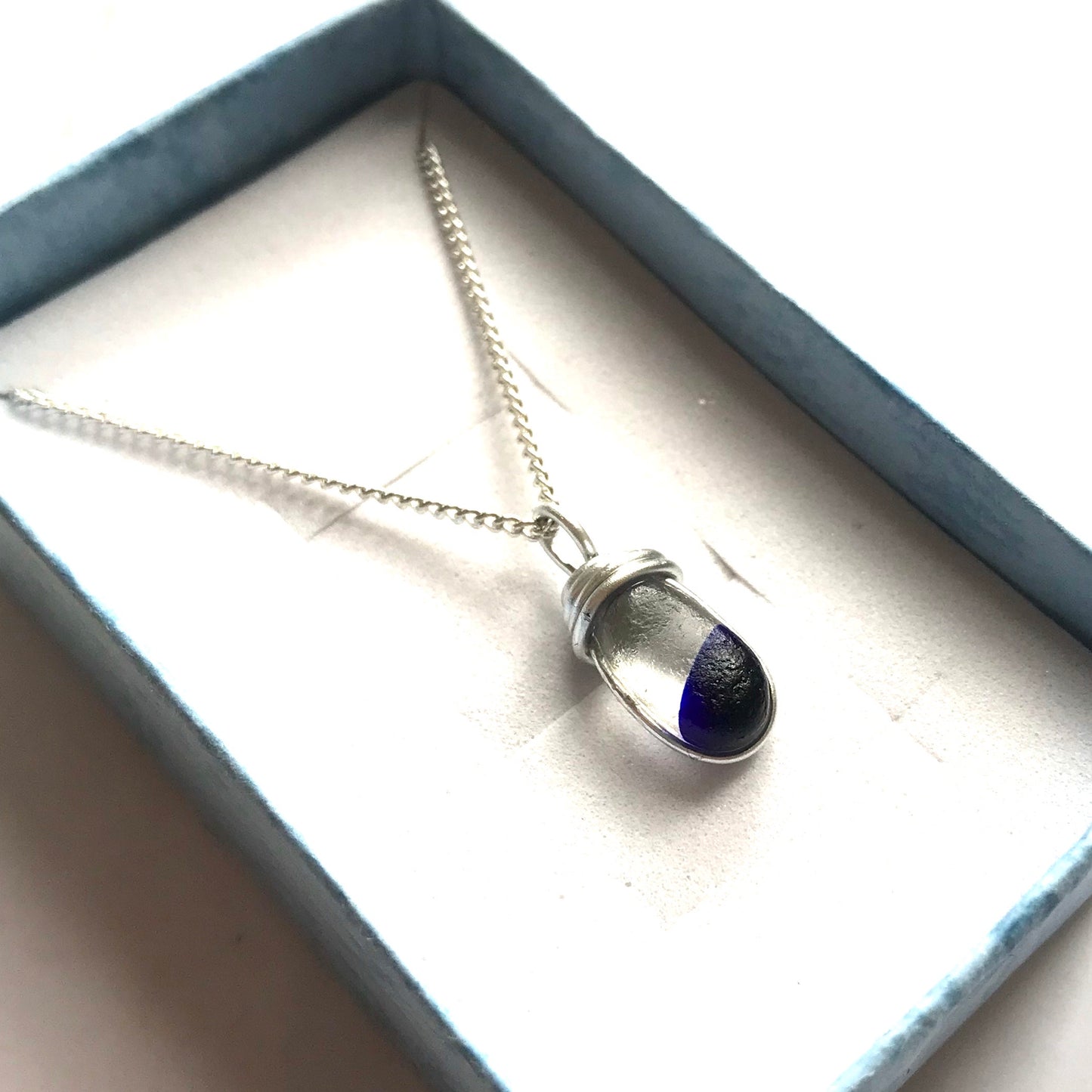 Deep Blue Spot Sea Glass Pendant on a Sterling Silver Chain