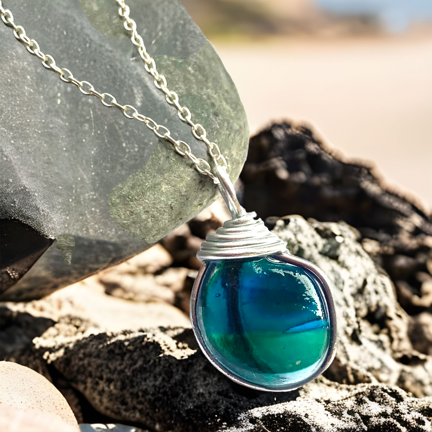 Turquoise and Green Seaham Sea Glass Multi Tone Pendant .
